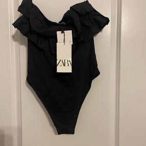 Zara black one piece swim suit or body suit with ruffle along top